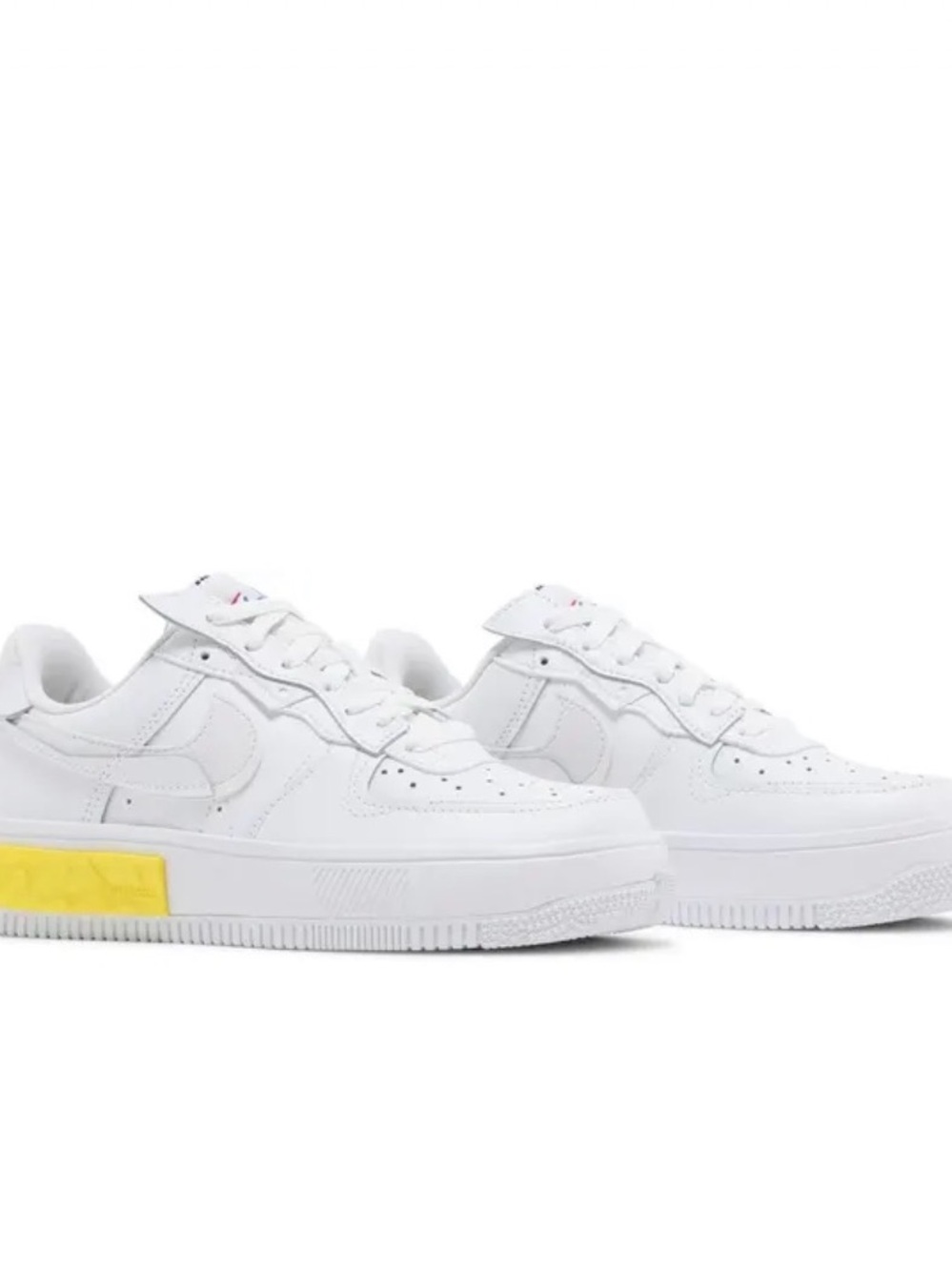 Nike Women’s White Low-Top Sneakers with Yellow Accent